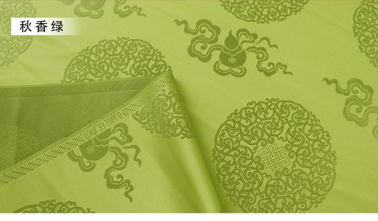 Tissu brocart bleu : Jacquard de rayonne de style sino-mongol (largeur : 75 cm)