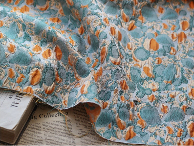 Tissu jacquard à fils dorés turquoise : 137 cm de large, revêtement de créateur