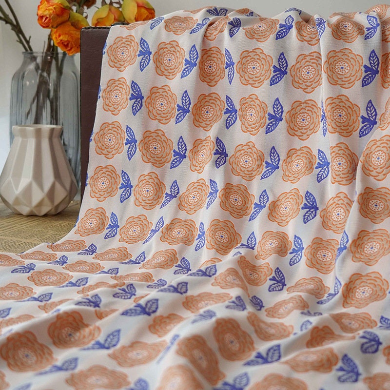Reversible Jacquard Fabric: Retro Orange Embossed Pattern, 65"W
