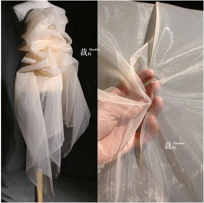 Tissu organza blanc pour mariage : 145 cm de large, polyester transparent