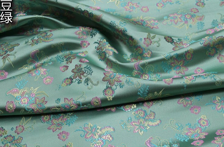 Tissu brocart à motifs floraux : mélange de soie et de rayonne, largeur 75 cm