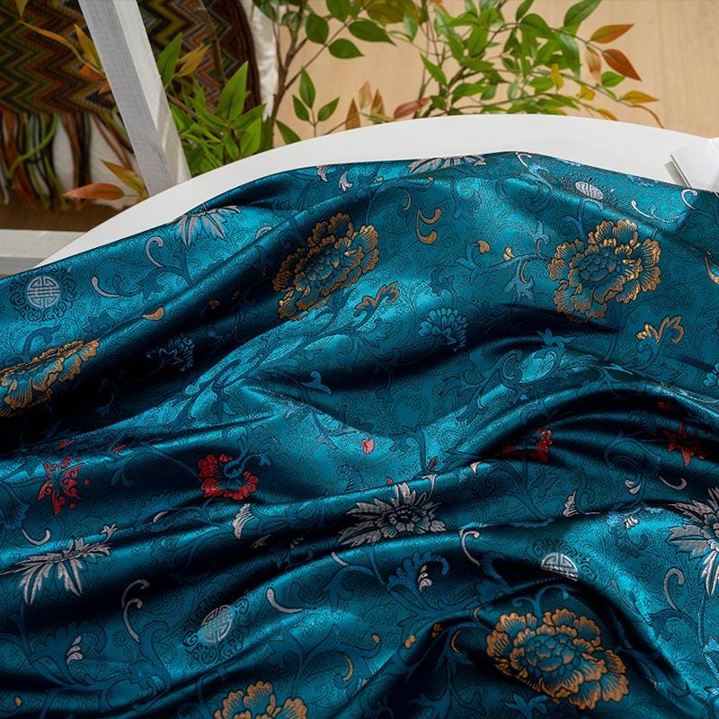 Tissu brocart floral bleu paon : mélange de rayonne, 75 cm de large