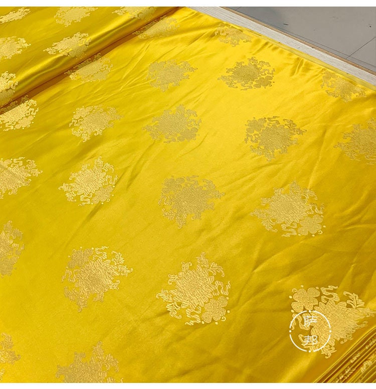Tissu brocart or brillant vintage : jacquard de soie et rayonne (largeur 75 cm)