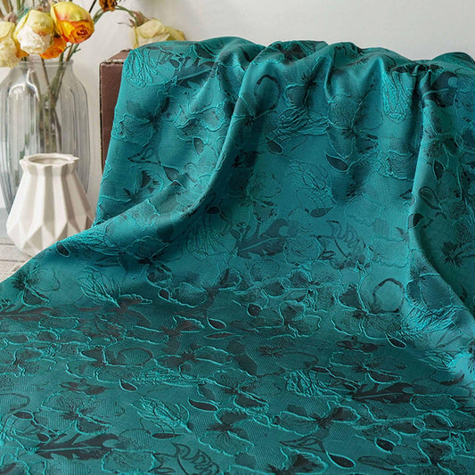 Tissu jacquard style vintage couleur turquoise avec motif floral abstrait en relief 3D, largeur 58 pouces