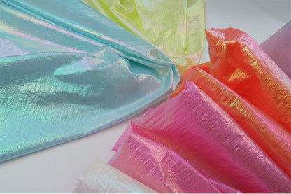 Tissu en nylon matelassé holographique : matériau imperméable pour doudoune en duvet d'oie