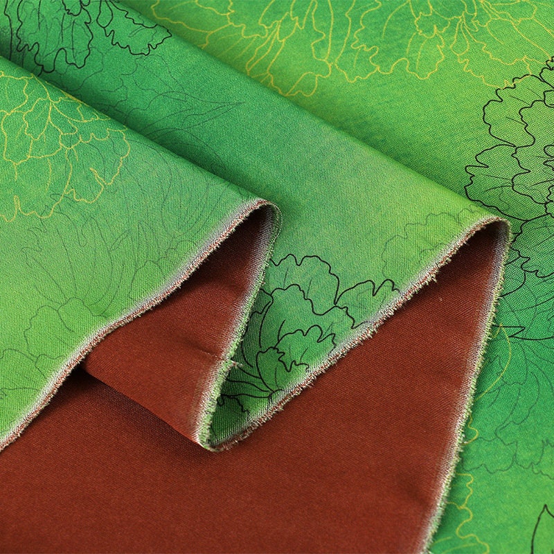 Tissu à imprimé floral pivoine : mélange de polyester et d’élasthanne vert à motifs botaniques, 150 cm de large