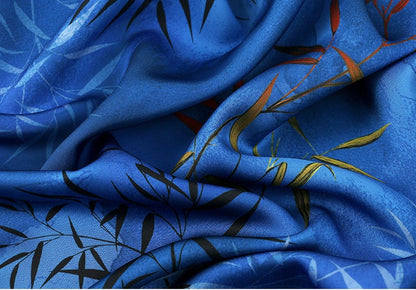 Tissu imprimé floral bambou : mélange de polyester et d’élasthanne bleu, 150 cm de large