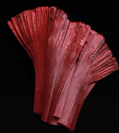 Dentelle organza à lustre métallique : tissu de créateur à volants 3D