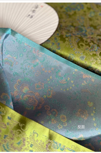 Tissu jacquard brocart vert : Satin brodé de motifs floraux et de vignes de Kuilong chinois