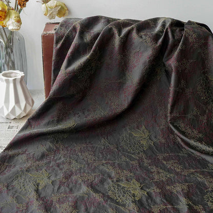 Tissu jacquard floral noir vintage : matière tissée rétro en relief, 145 cm de large