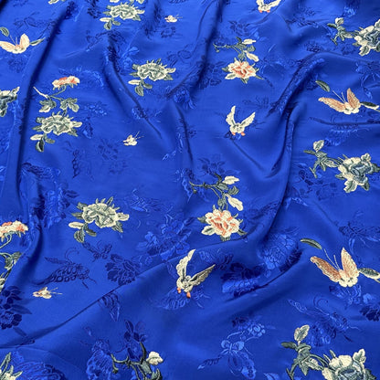 Tissu brodé à motifs floraux : mélange coton-rayonne de 150 cm de large