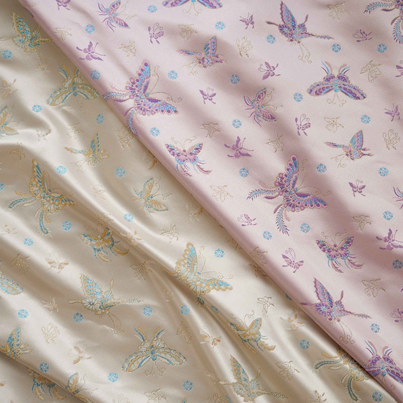 Tissu Butterfly Gold Thread : 150 cm de large, polyester tissé orné