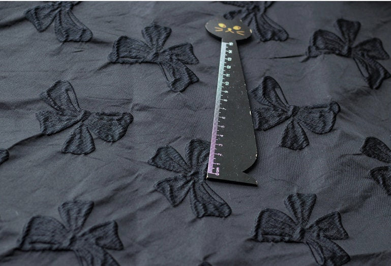 Black Bow Jacquard Fabric: Yarn-Dyed Embossed Upholstery Material, 57" Wide
