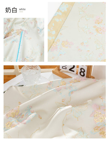 Tissu jacquard papillon à fil doré : texture 3D, largeur 142 cm