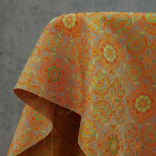 Tissu jacquard à médaillon vintage orange : fil teint à volutes arabesques, largeur 150 cm