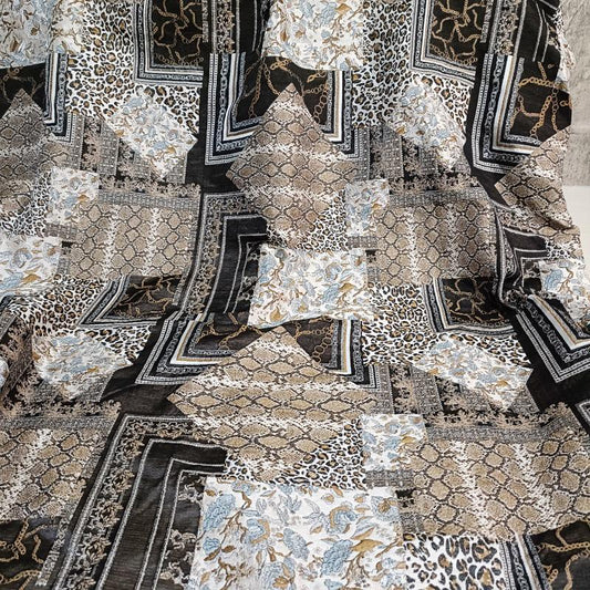 Tissu jacquard à motif animalier : revêtement texturé 3D, largeur 140 cm (55 po), vendu au mètre.