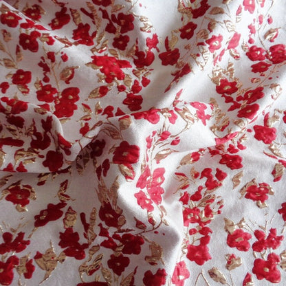 Tissu jacquard à motif floral et fils dorés : texture 3D pour ameublement et costumes - 142 cm de large