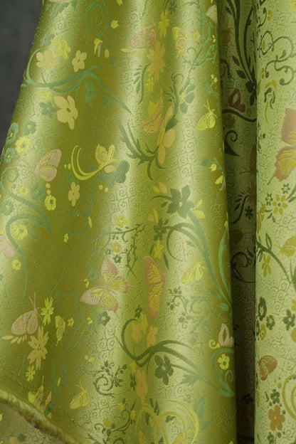 Tissu brocart papillon vert printemps : jacquard polyester de 165 cm de large
