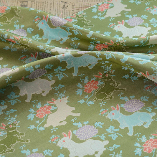 Tissu brocart vert haricot à motif lapin : mélange de rayonne de 168 cm de large, pour la confection de cheongsams.