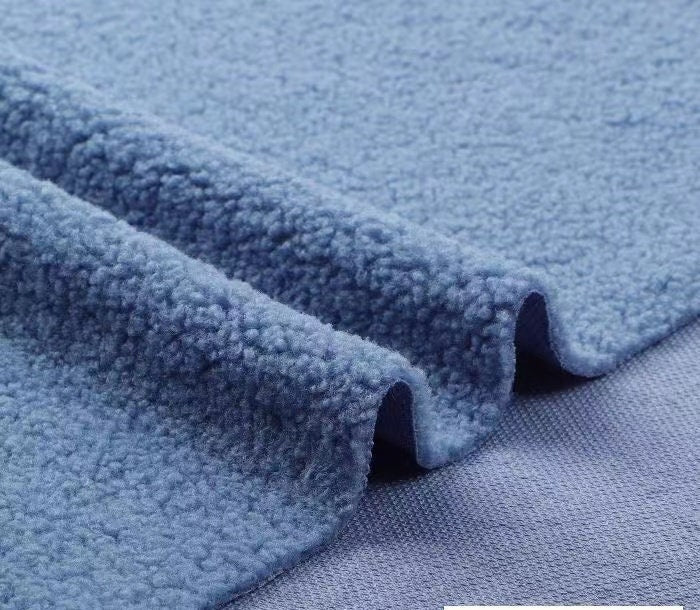 Tissu polaire corail duveteux : maille polyester, 160 cm de large – au mètre