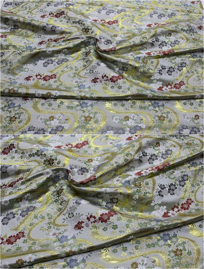 Tissu jacquard floral Nishijin : brocart de soie noir et or