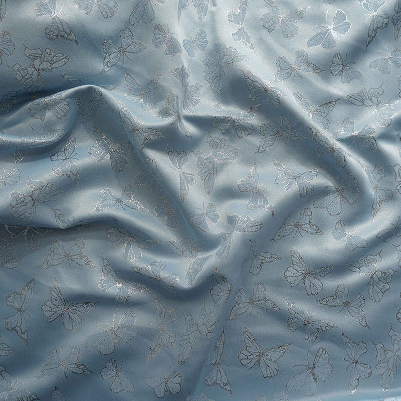 Blue Butterfly Jacquard Fabric: Silver Thread Rayon, 59" Wide