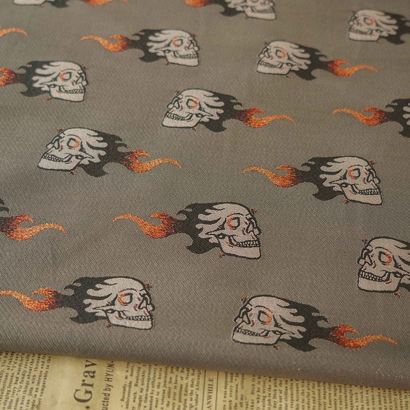 Tissu jacquard à fils d'or : matériau pour costume de squelette d'Halloween