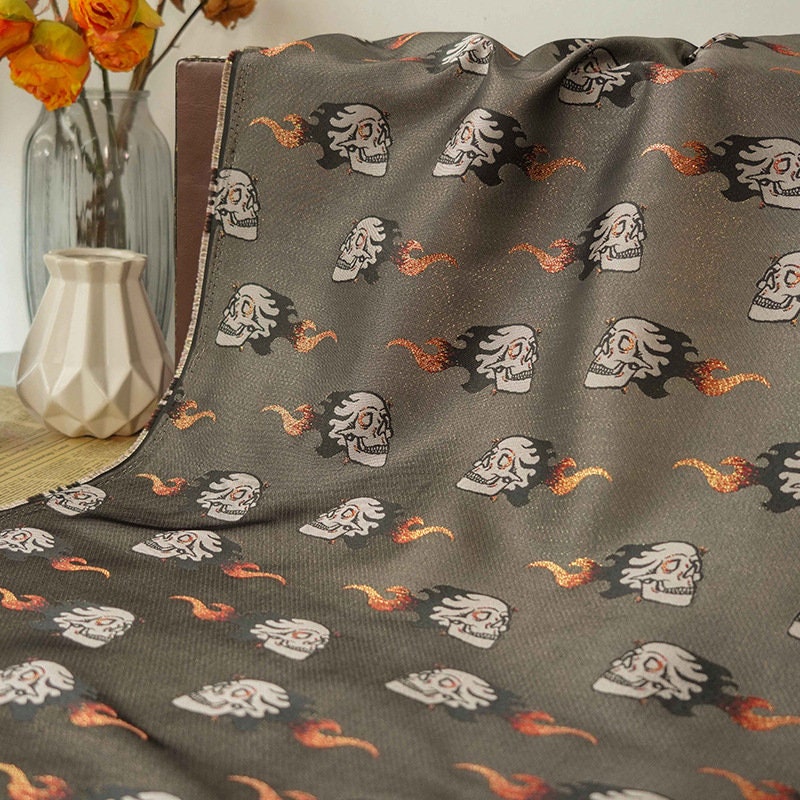 Tissu jacquard à fils d'or : matériau pour costume de squelette d'Halloween