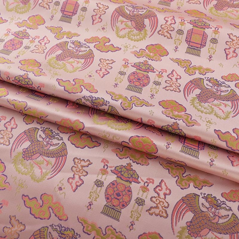 Tissu à motif tibétain Bada : revêtement de cheongsam rouge, décoration de costume (59 po de large)