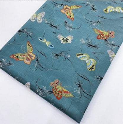 Tissu jacquard papillon : 145 cm de large, en polyester