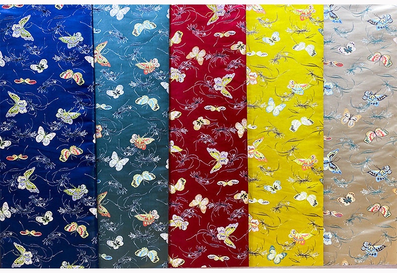 Tissu jacquard papillon : 145 cm de large, en polyester