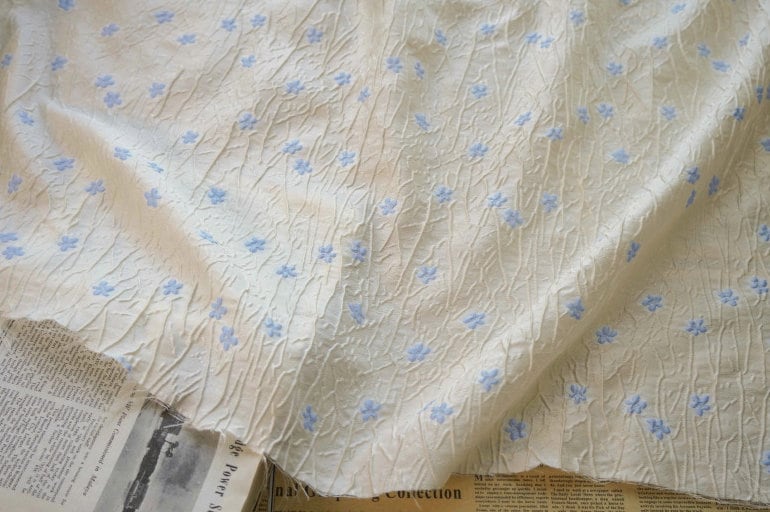Embossed Beige Polyester Fabric, Blue Flowers, Upholstery & Costume, 56"W