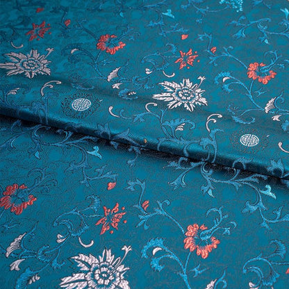 Tissu brocart floral bleu paon : mélange de rayonne, 75 cm de large