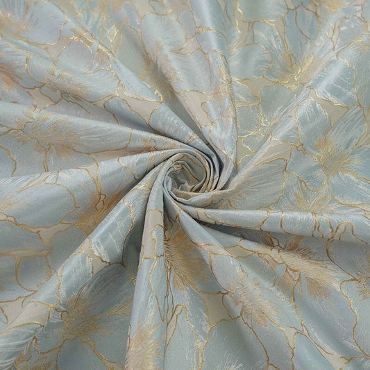 Tissu jacquard à broderie florale dorée : 162,5 cm de large. Idéal pour l’ameublement, les costumes et les rideaux. Vendu au mètre.