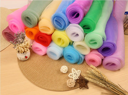 Tissu organza : tulle transparent de 150 cm de large pour robes, décorations et costumes.