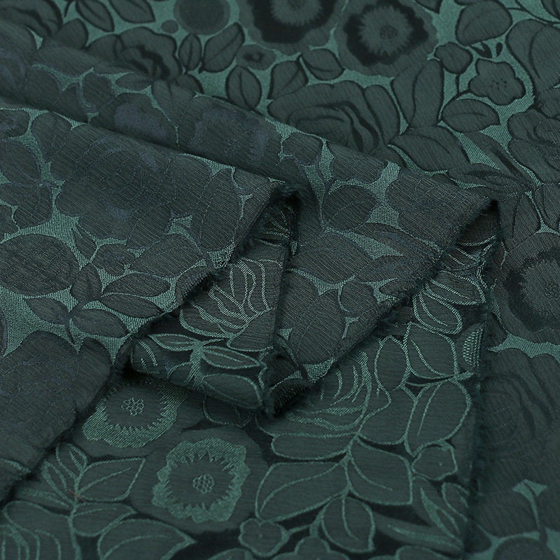 Tissu imprimé floral vert foncé : mélange bicolore de polyester et d’élasthanne, 150 cm de large