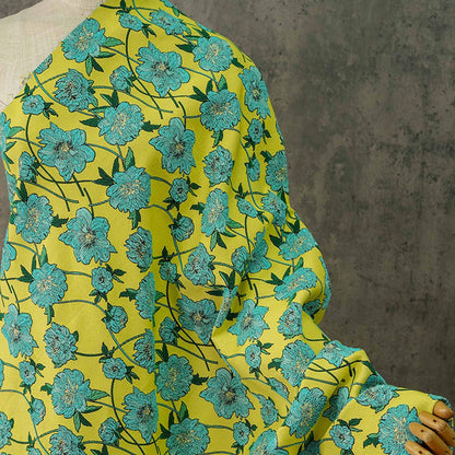 Tissu jacquard réversible : motif floral 3D bleu et jaune, largeur 135 cm