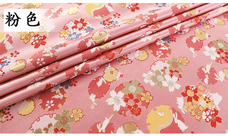 Tissu brocart jacquard Sakura Rabbit : rouge, rose, or, bleu (au mètre)