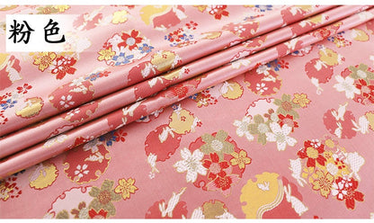 Tissu brocart jacquard Sakura Rabbit : rouge, rose, or, bleu (au mètre)