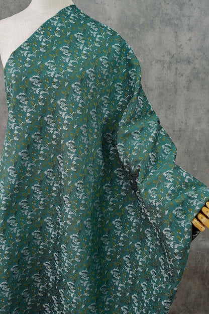 Tissu jacquard floral turquoise : matériau tissé couleur pour la couture et l'ameublement
