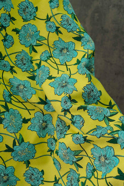 Tissu jacquard réversible : motif floral 3D bleu et jaune, largeur 135 cm