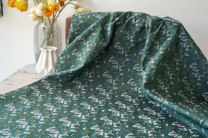 Tissu jacquard floral turquoise : matériau tissé couleur pour la couture et l'ameublement