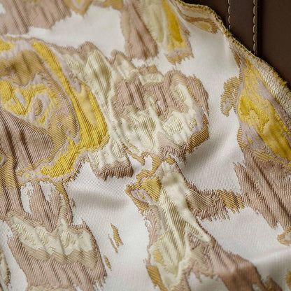 Tissu jacquard gaufré : motif à blocs jaune-brun, 140 cm de large