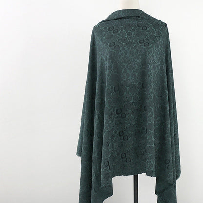 Tissu imprimé floral vert foncé : mélange bicolore de polyester et d’élasthanne, 150 cm de large
