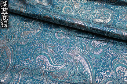 Tissu brocart argenté à motifs floraux : largeur 75 cm, matière couture rigide