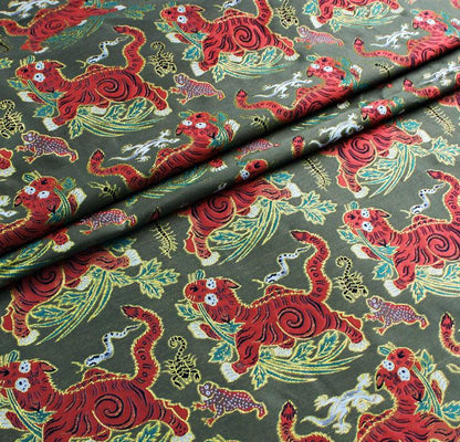 Tissu rayonne à motif tigre : motif or mongol tibétain, 147 cm de large