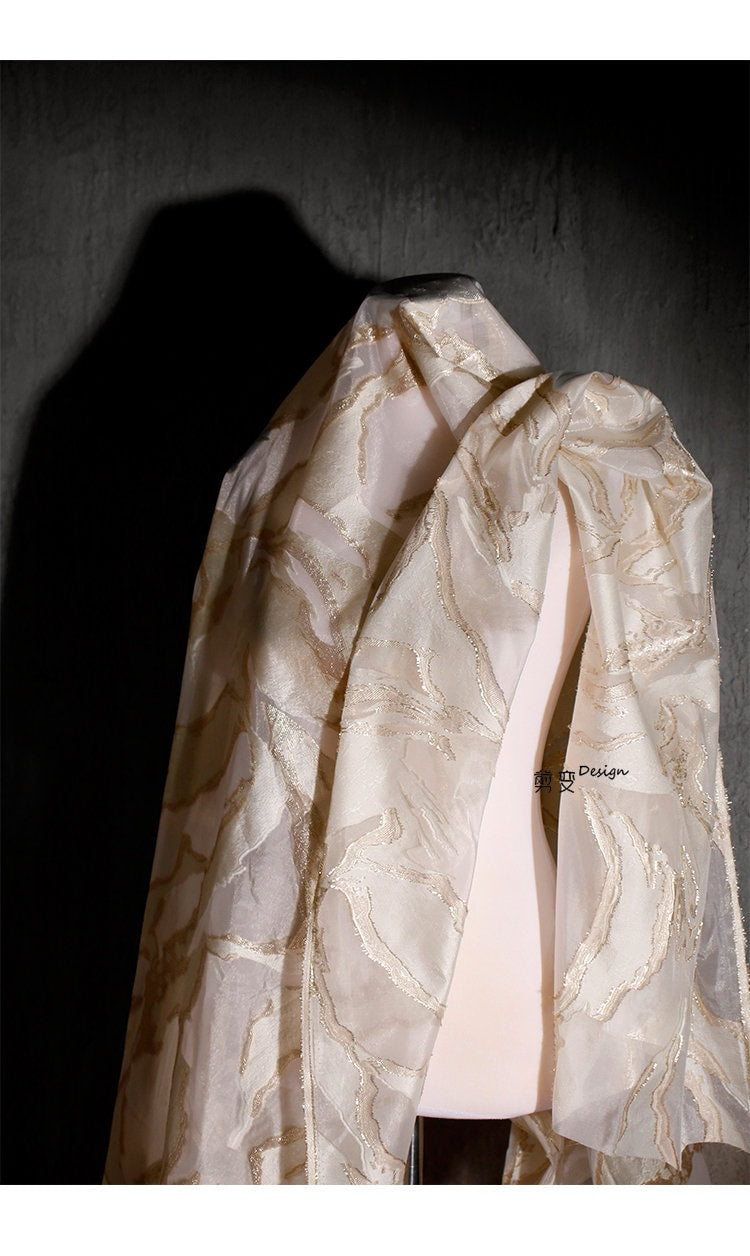 Tissu organza jacquard 3D doré : tissu transparent gaufré, 145 cm de large
