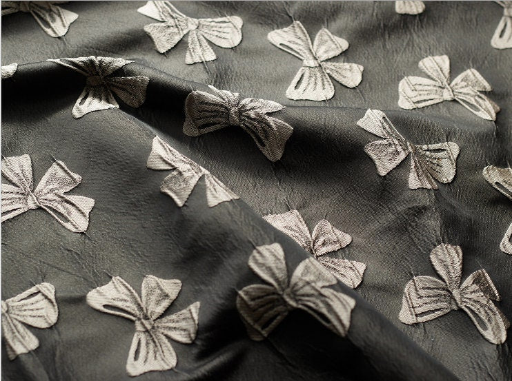 Black Bow Jacquard Fabric: Yarn-Dyed Embossed Upholstery Material, 57" Wide
