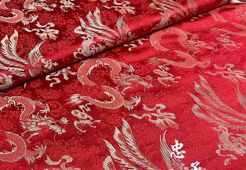 Tissu brocart de soie rouge et or : motif dragon et phénix chinois pour ameublement et costumes - 75 cm de large