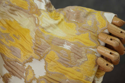 Tissu jacquard gaufré : motif à blocs jaune-brun, 140 cm de large